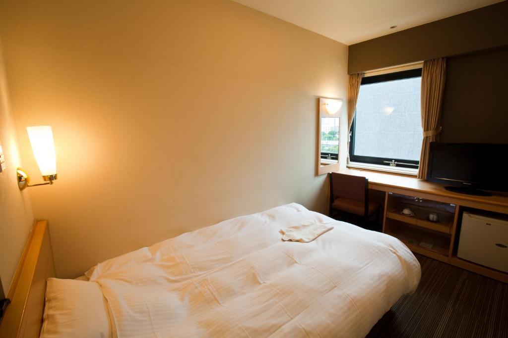 Hotel Harmonie Cinq Kitakyushu Habitación foto